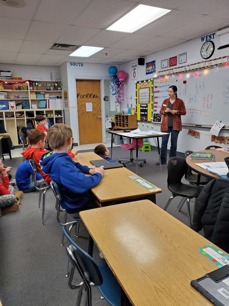 Amy presented to 4th grade students about Iowa livestock